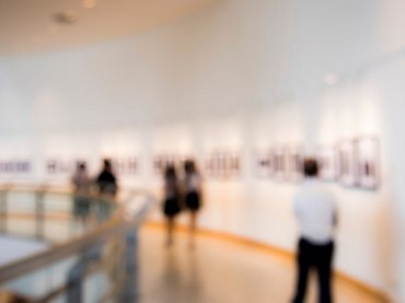 people-enjoying-art-exhibition_53876-15071