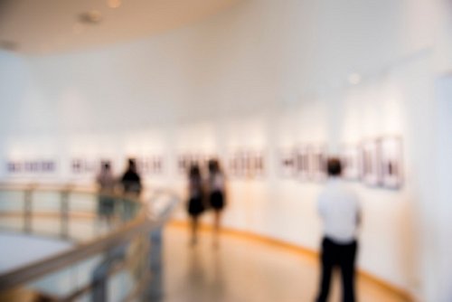 people-enjoying-art-exhibition_53876-15071