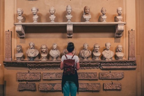 woman-watching-statues_413556-3